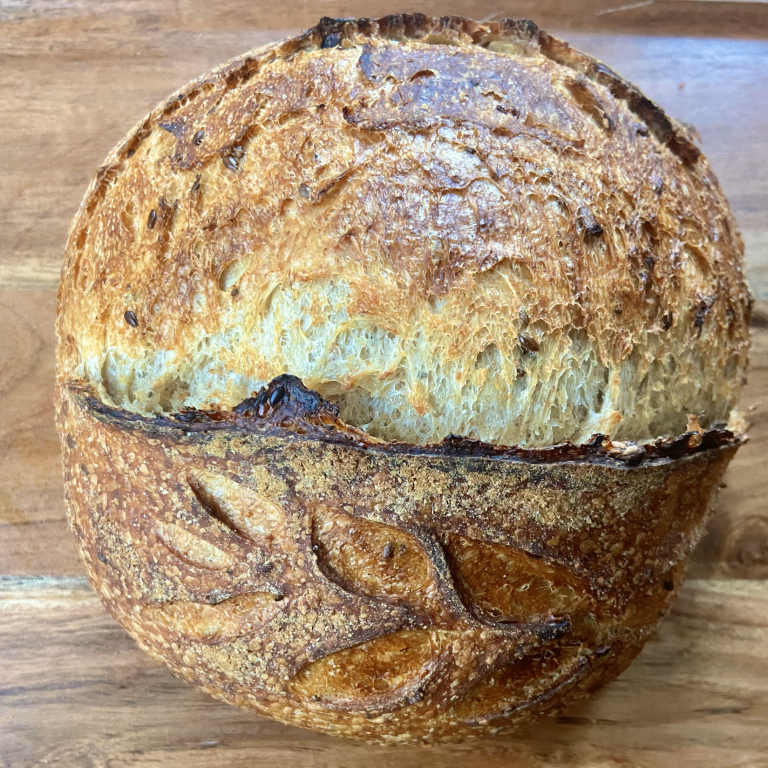 Picture of a rustic harvest seed infused sourdough 