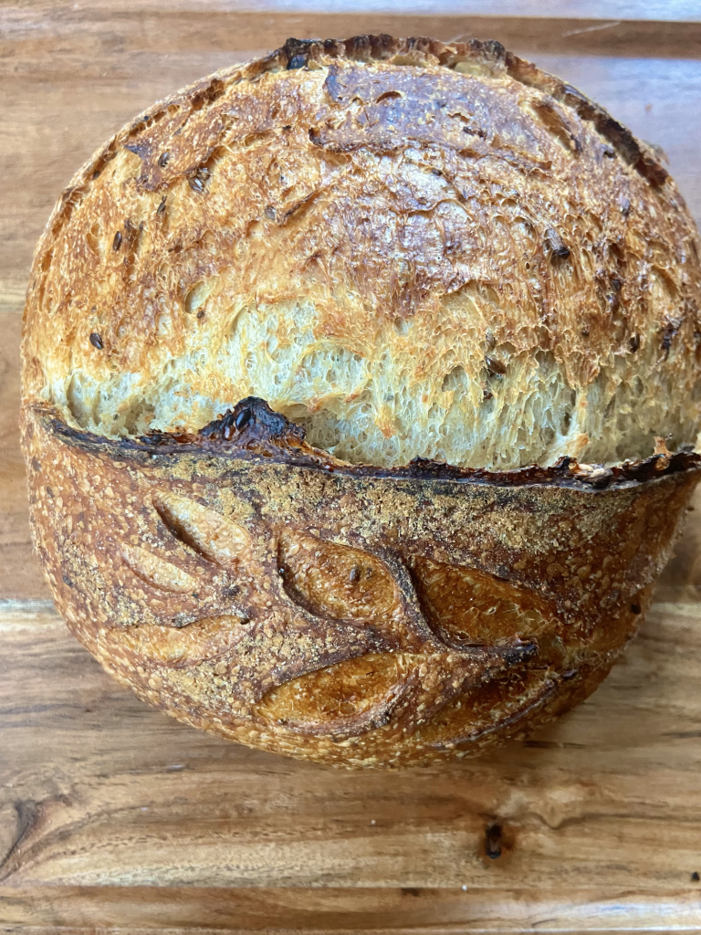 Picture of a rustic harvest seed infused sourdough 